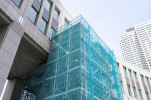 Scaffolding reinforcing a building structure — a visual parallel to rebuilding financial stability.